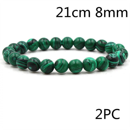 Elegant malachite stone bracelets with unique textures and patterns, perfect for a stylish accessory.