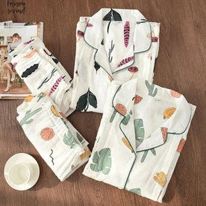 Traditional maternity pajama set with 100% cotton batik fabric, ankle-length trousers, and full-length bell sleeves