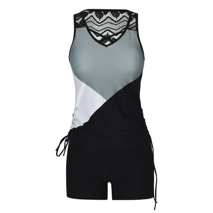 Black high-waisted women's swimsuit with separate tied bikini top and briefs bottoms on a mannequin.