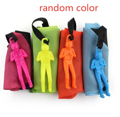 Colorful paratrooper toy parachute with soldier figure, designed for outdoor fun and educational play