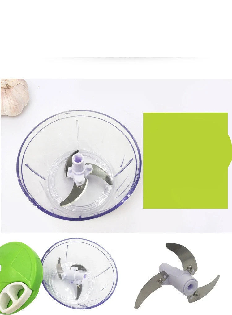 Manual vegetable fruit shredder with stainless steel blade on kitchen counter