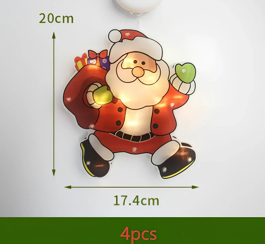 LED Christmas hanging lights with suction cups showing snowman design illuminated on window