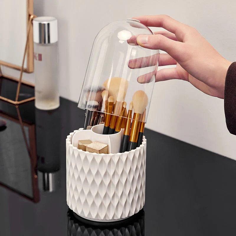 Rotating makeup brush holder with transparent cover, designed for organization and protection of cosmetic tools