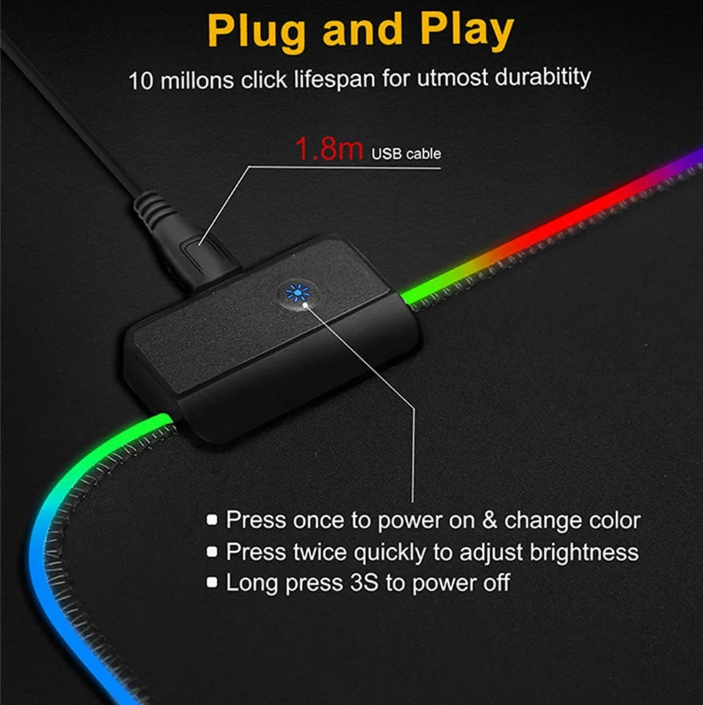 Black RGB gaming mouse pad with illuminated surface measuring 900x400mm and 4mm thickness