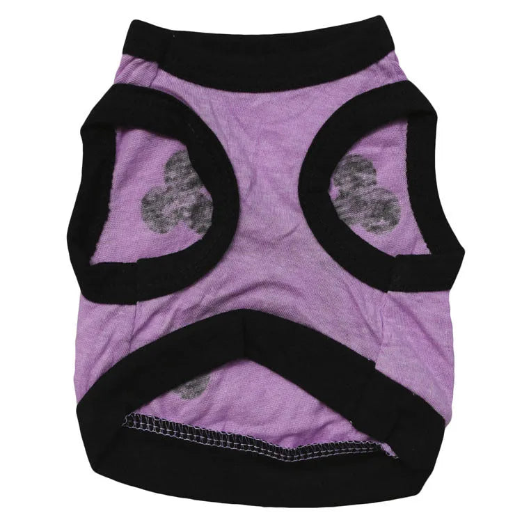 Blue dog vest with orange skull bones pattern, tank top style for a small dog.