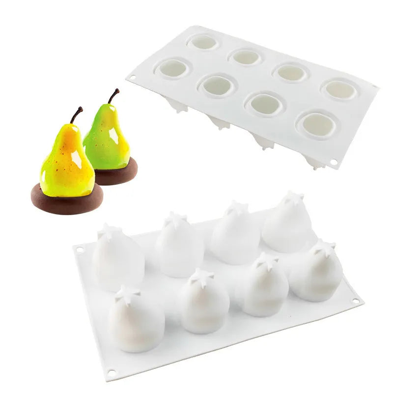 Green silicone baking mould with six cavities shaped like pineapples and pine cones for making desserts.