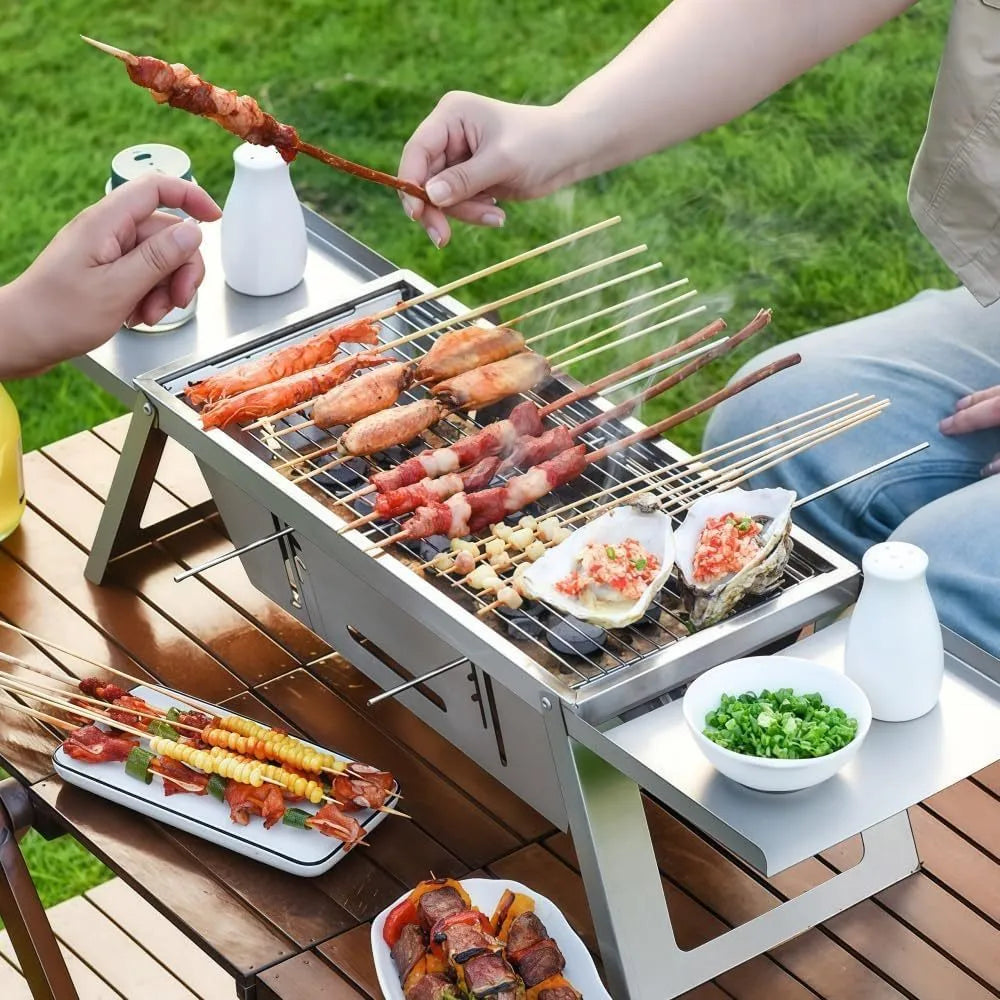 Small foldable charcoal grill collapsed to 40cm size with charcoal tray