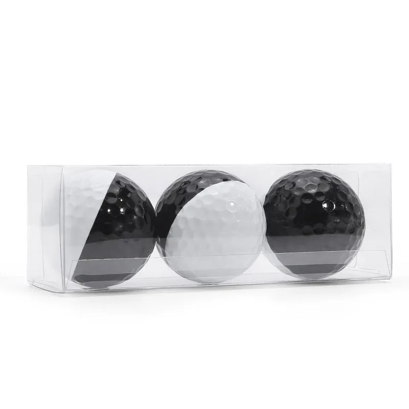 Two-tone black and white golf practice ball, 42mm, titanium sarin housing, soft rubber core, 3 per box
