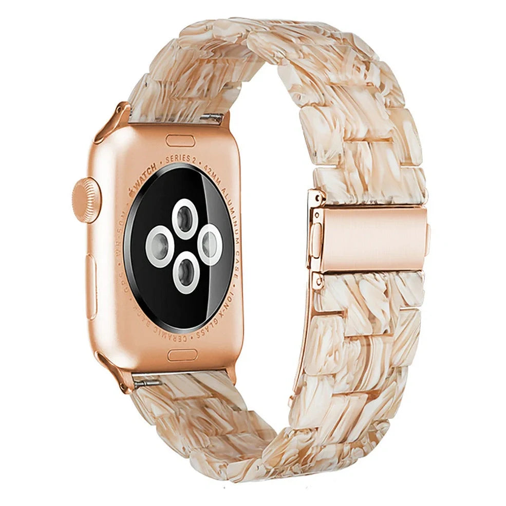 Slim resin Apple Watch strap showing attachment mechanism and colour options