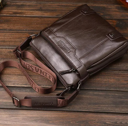 Men's soft messenger shoulder bag with zip closure and polyester lining in black, brown, or khaki