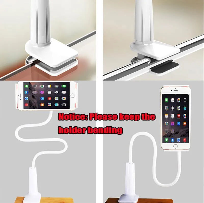 Bedside oversize flat panel handset with long arm holding a mobile phone on a table