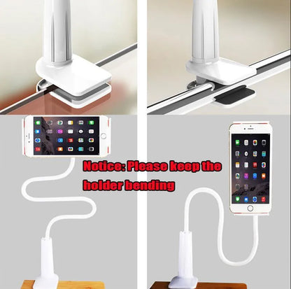 Bedside oversize flat panel handset with long arm holding a mobile phone on a table