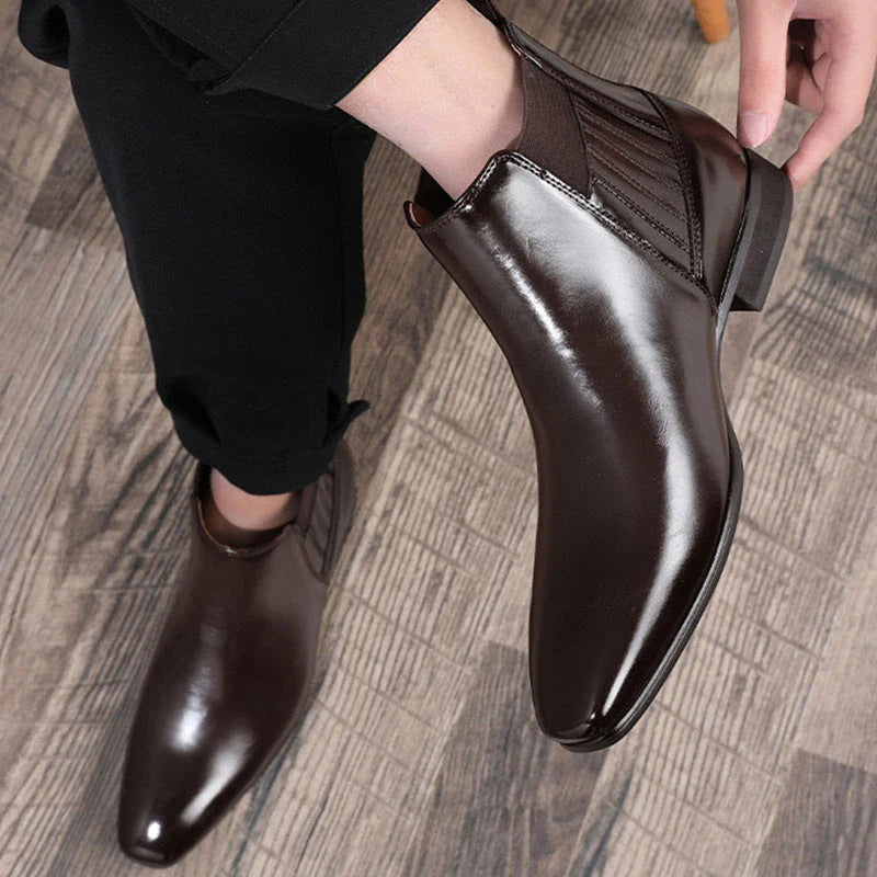 Sleek Chelsea-style boots for men with pointed toe and square heel, available in black and brown colors
