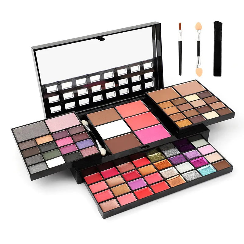 74 colour makeup palette open to show eyeshadows, lip glosses, and face powders with included brushes