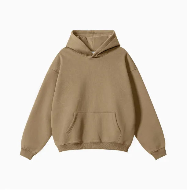Men's grey terry hooded sweater with drop-shoulder sleeves and front pocket, showing textured cotton fabric