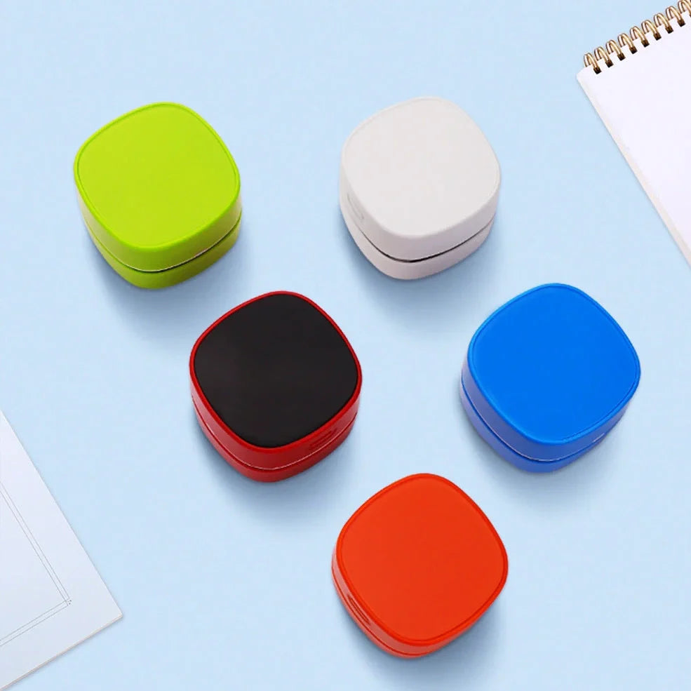 Desktop vacuum cleaner with two-in-one brush nozzle for keyboard and surface cleaning