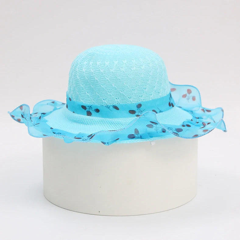 Children's princess straw hat with floral accents and wide brim for sun protection