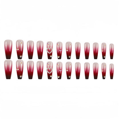 Set of long ballet-style fake nail tips with wine red gradient, white plaid pattern, and pearl heart decorations