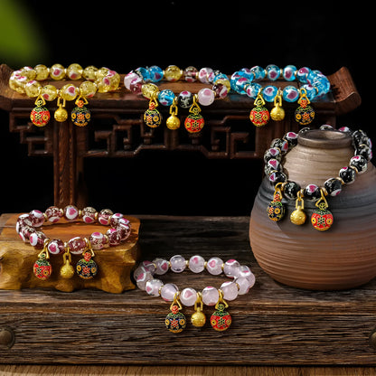 Handmade glass bracelet with 10mm swallowing gold beast cherry blossom heart charm in six colour options