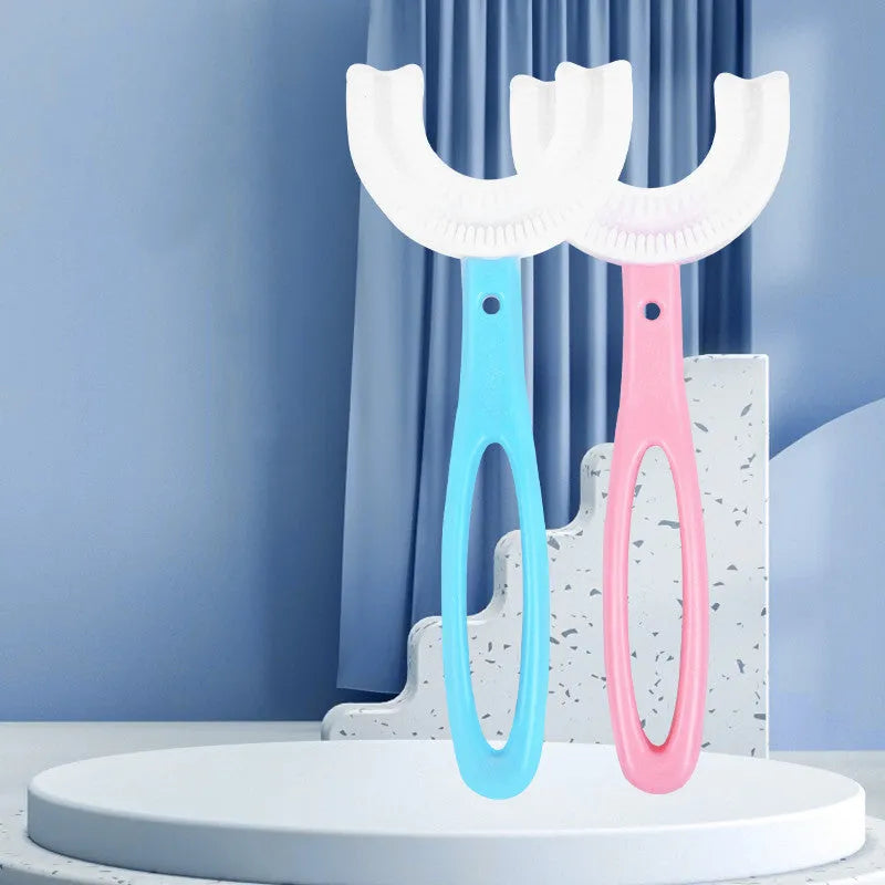 Children's U-shaped soft rubber toothbrush in pink and blue colours.