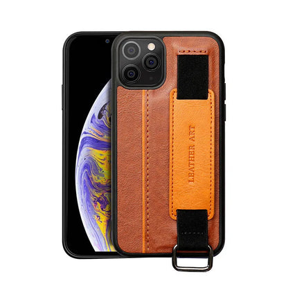 Brown imitation leather iPhone case with wrist strap attached, showing decorative stitching detail