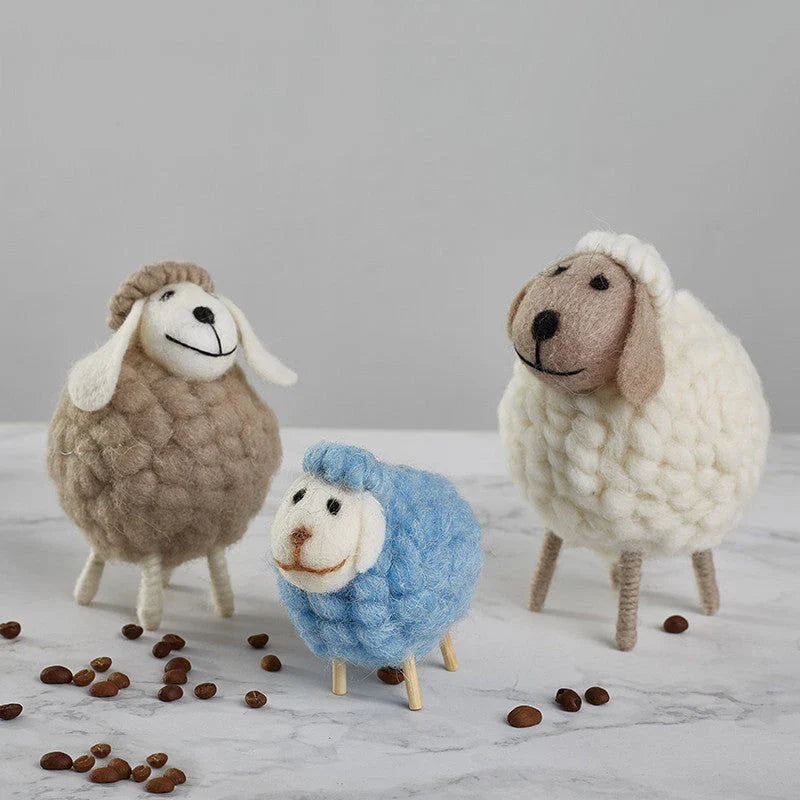 Adorable plush sheep decorations in various sizes and color combinations, perfect for adding a cozy, farmhouse-inspired touch to any home.