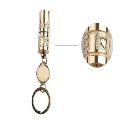 Gold-coloured waterproof zinc alloy mini LED flashlight on a keyring.