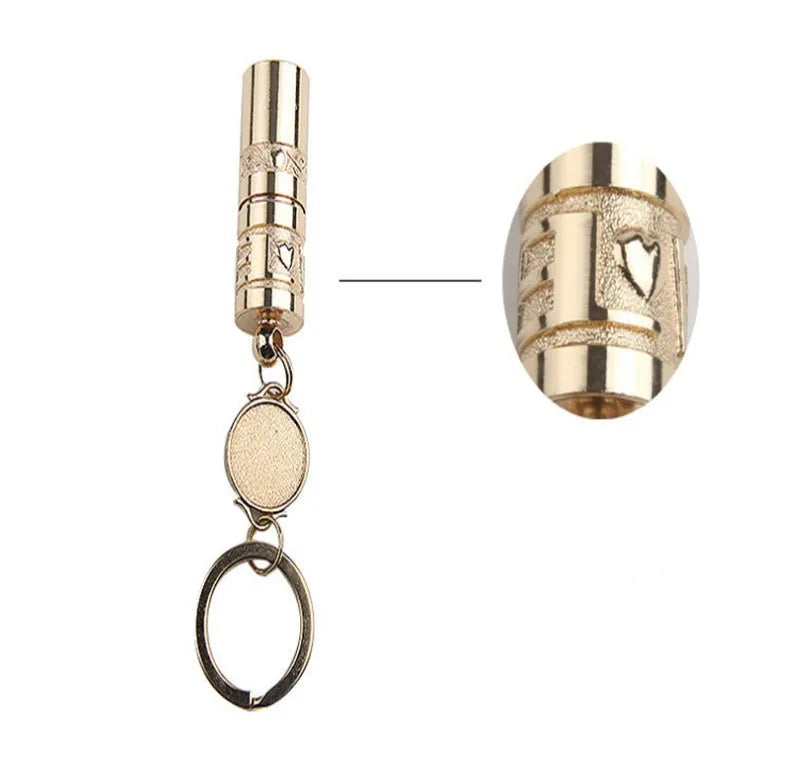 Gold electroplated waterproof mini LED keychain torch with zinc alloy body on a keyring.