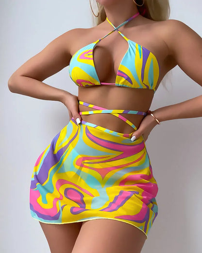 Yellow striped halter neck swimsuit with lace-up front and matching high-waisted skirt and shorts