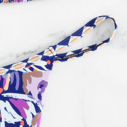 Women's floral print polyester swimsuit briefs with triangle bag design in available sizes