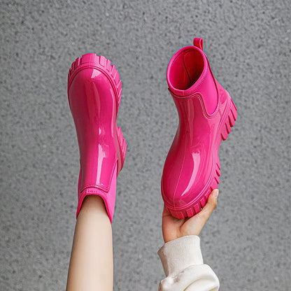 PVC low tube rain boots in apricot colour with non-slip sole and flat heel design