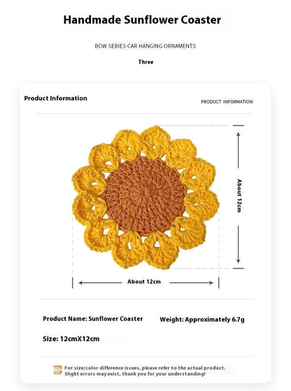 Hand-woven wool flower coaster on a wooden table