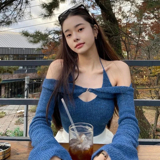 Women's off-shoulder knitted sweater in black, blue, and apricot with V-neck and drop shoulder design