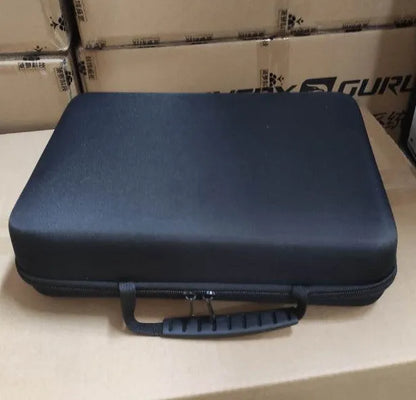 Black and white percussion massage gun with 24V battery for muscle recovery.