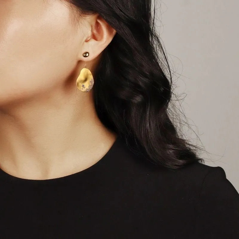 Asymmetric drop earrings with gold plated floral design and zircon stone accents for women seeking Chinese-inspired natural style jewellery in silver or gold colour options