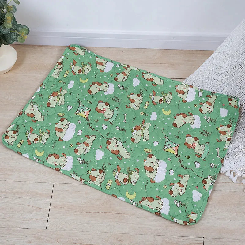 Reusable cloth pet urine pad with animal print and waterproof non-slip backing in various sizes.