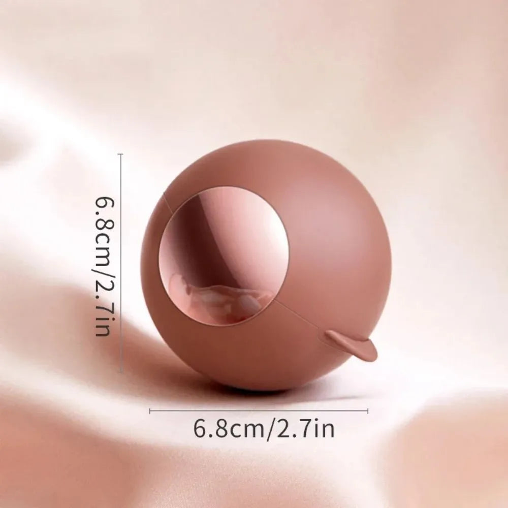 White, pink, green, and deep pink coloured ABS hair removal ball with a handle for pet hair and lint.