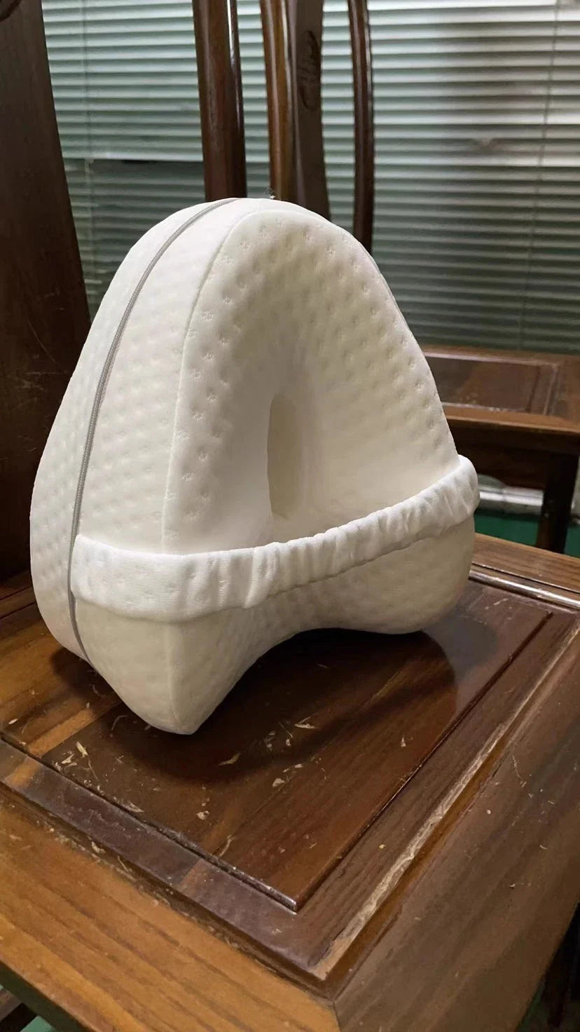 Ergonomic apple-shaped memory foam pillow with breathable fabric and adjustable design for comfortable sleep