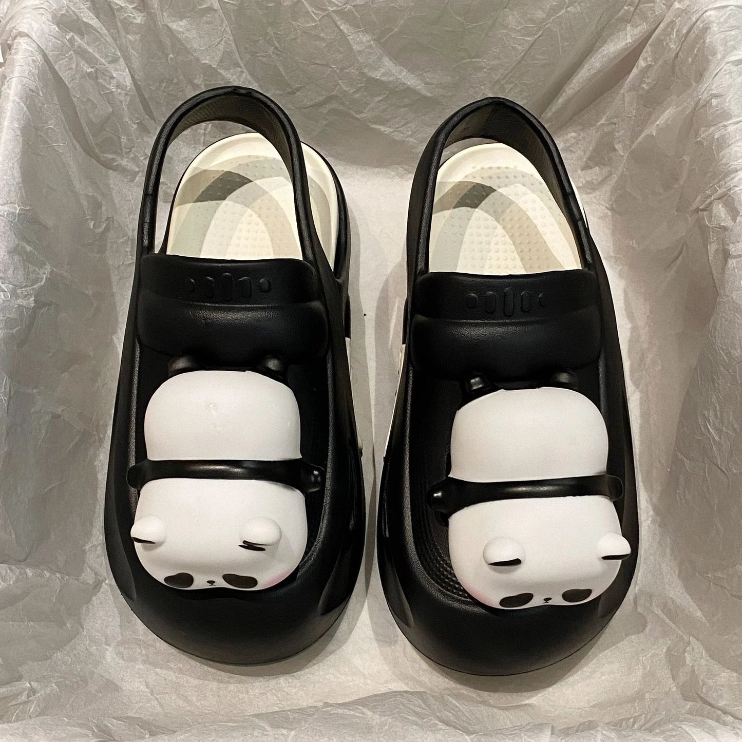 Cozy Panda Night Light Slippers with a charming panda design, built-in night light, and comfortable EVA construction