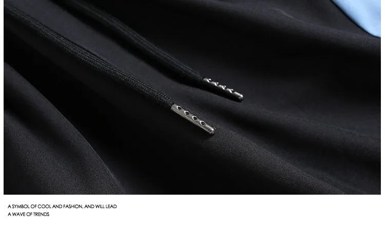 Men's black loose-fit quick-dry sports shorts with elastic waist, shown above the knee.