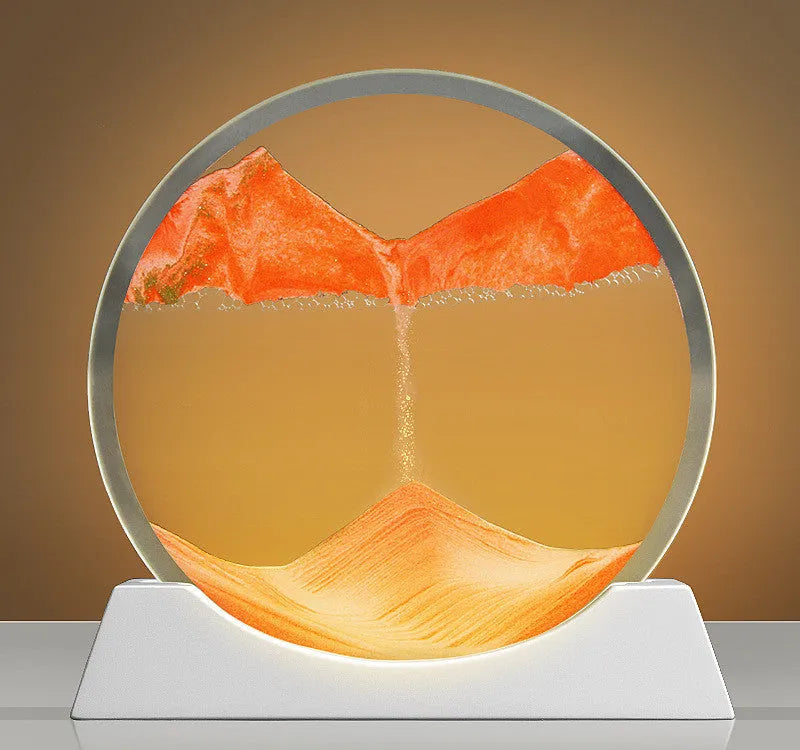 A rotary abstract night lamp with coloured sand falling inside clear glass, showing blue variant.