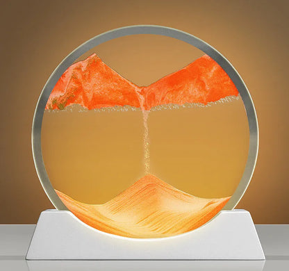 A rotary abstract night lamp with coloured sand falling inside clear glass, showing blue variant.