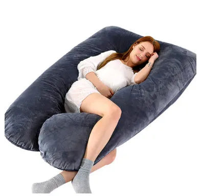 Large U-shaped pregnancy support pillow with removable cover and abdominal support belt.