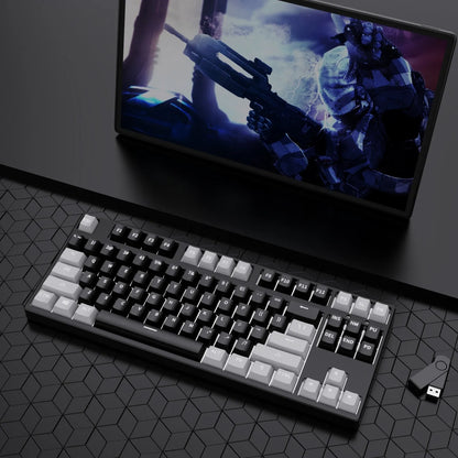 87-key mechanical keyboard with two-tone coloured keycaps on metal case