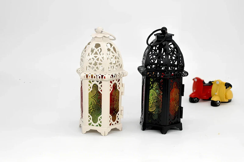 Wrought iron candle holder with 16cm height and 7cm diameter, featuring handmade welding and hanging design for atmospheric candlelight display in home decor settings