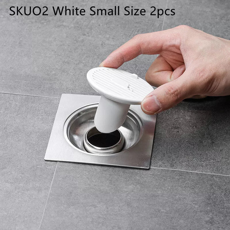 Whale Magnetic Suction Floor Drain Cover in white, orange, or green, blocking sewer odors with a tight seal