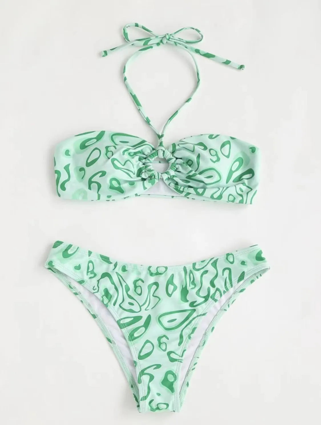 Blue floral pattern bandeau bikini swimsuit with backless design on mannequin