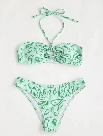Blue floral pattern bandeau bikini swimsuit with backless design on mannequin