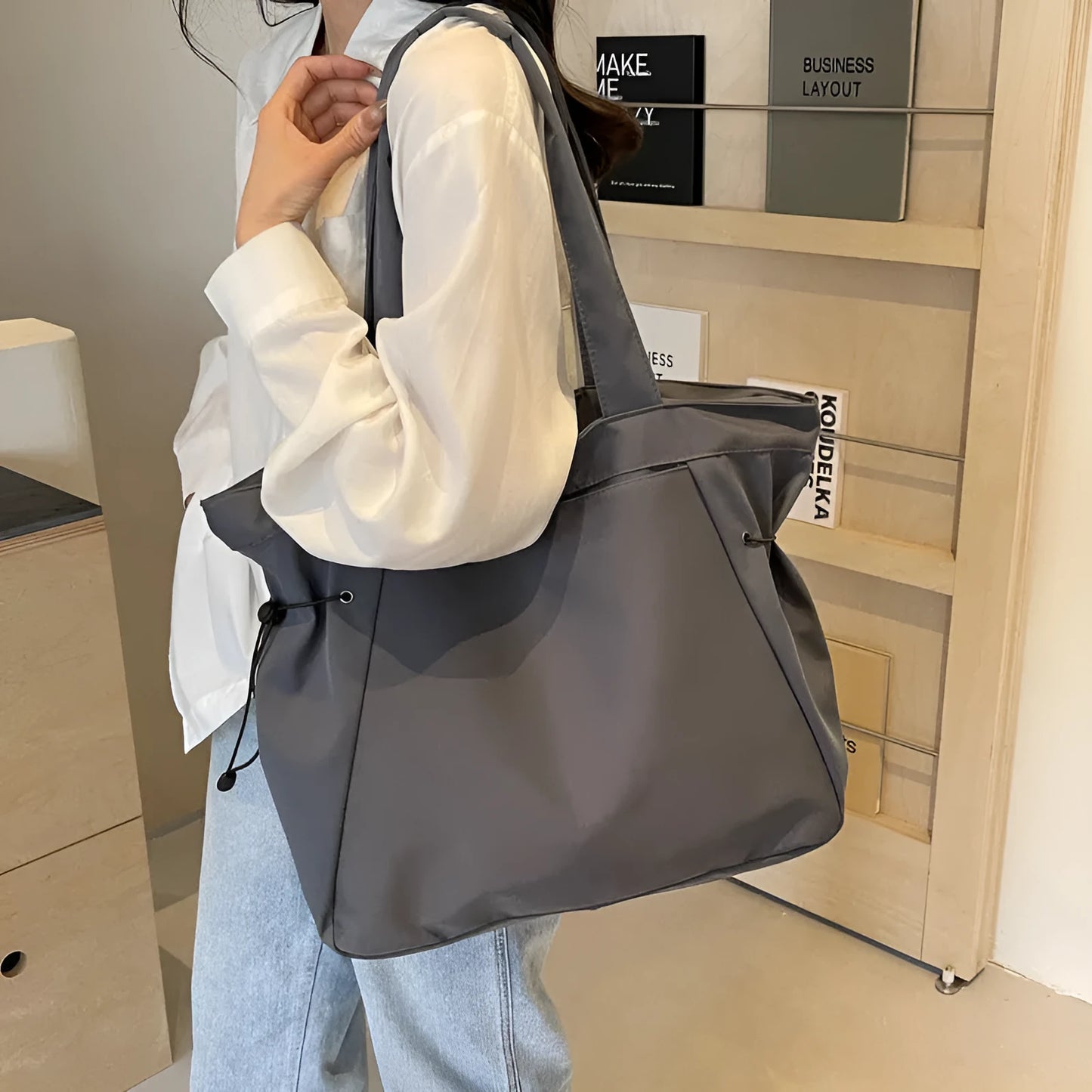 Soft Oxford cloth foldable commuter tote bag in street style, shown in multiple colour options.