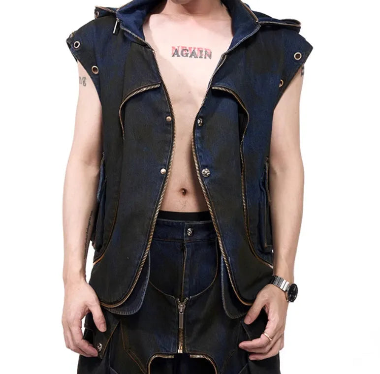 Blue hooded denim vest coat with front zip worn with matching trousers in a two-piece set.